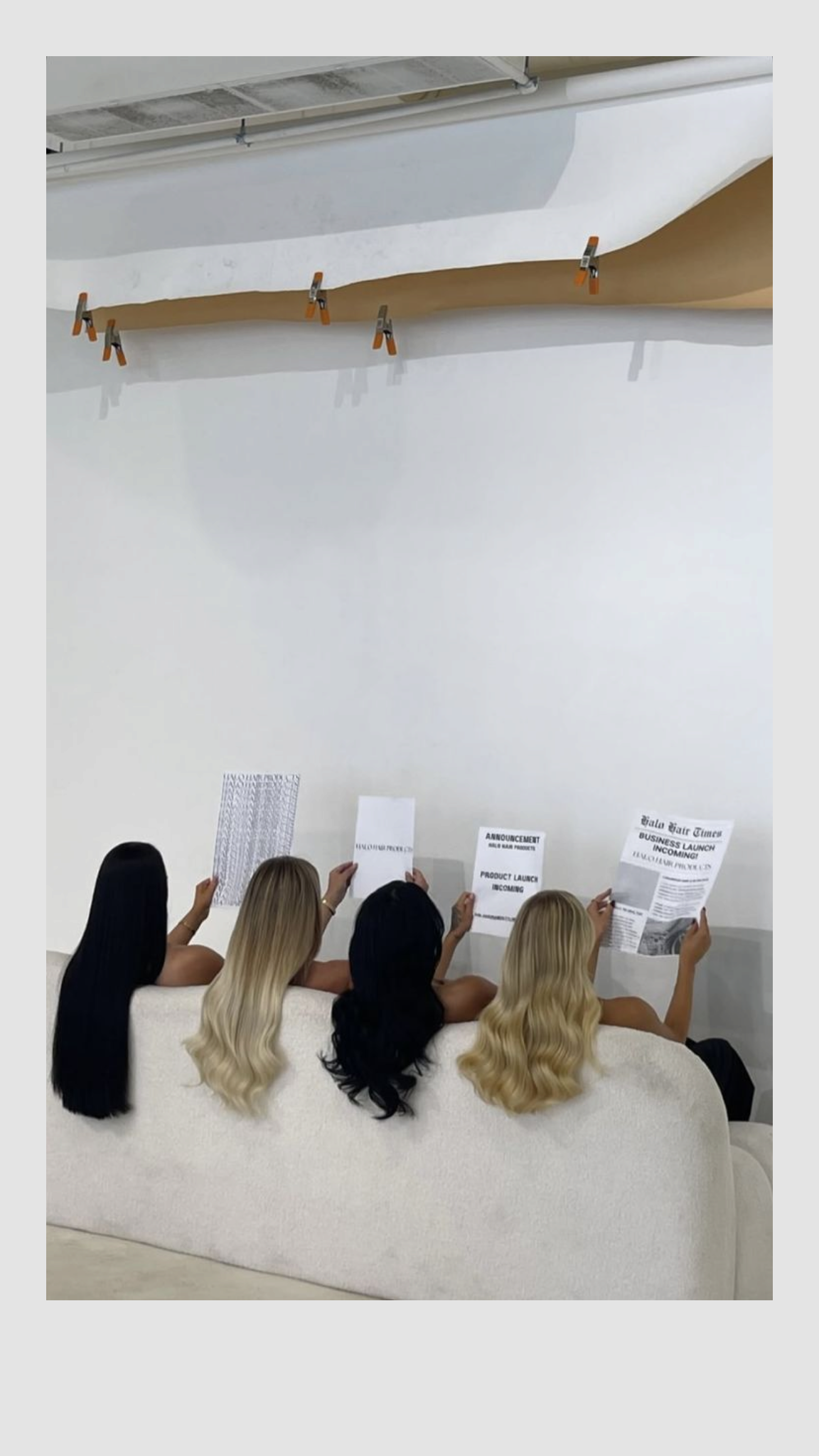 Blondie Hair Salon FL team seated together, hair styled in dark and blonde tones